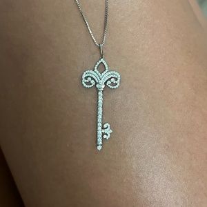 Tiffany Platinum Fleur de Lis key Pendant.